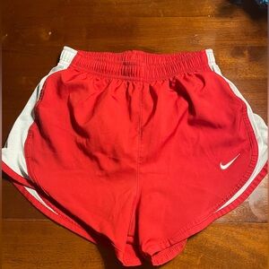 Red Nike shorts